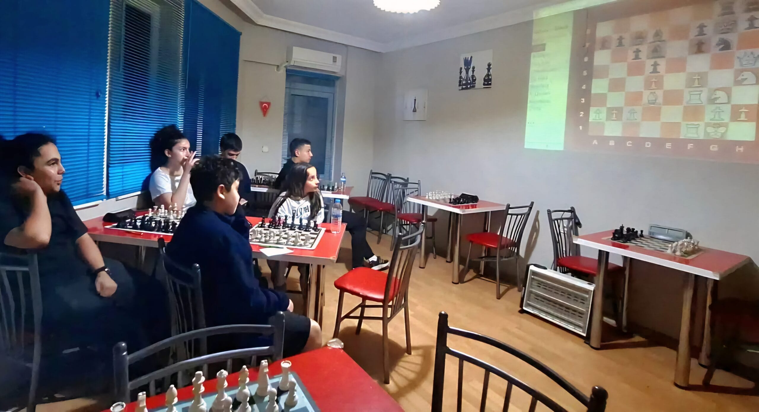 Chess Club Antalya students attending a face-to-face chess lesson at Grandmasters Chess Club